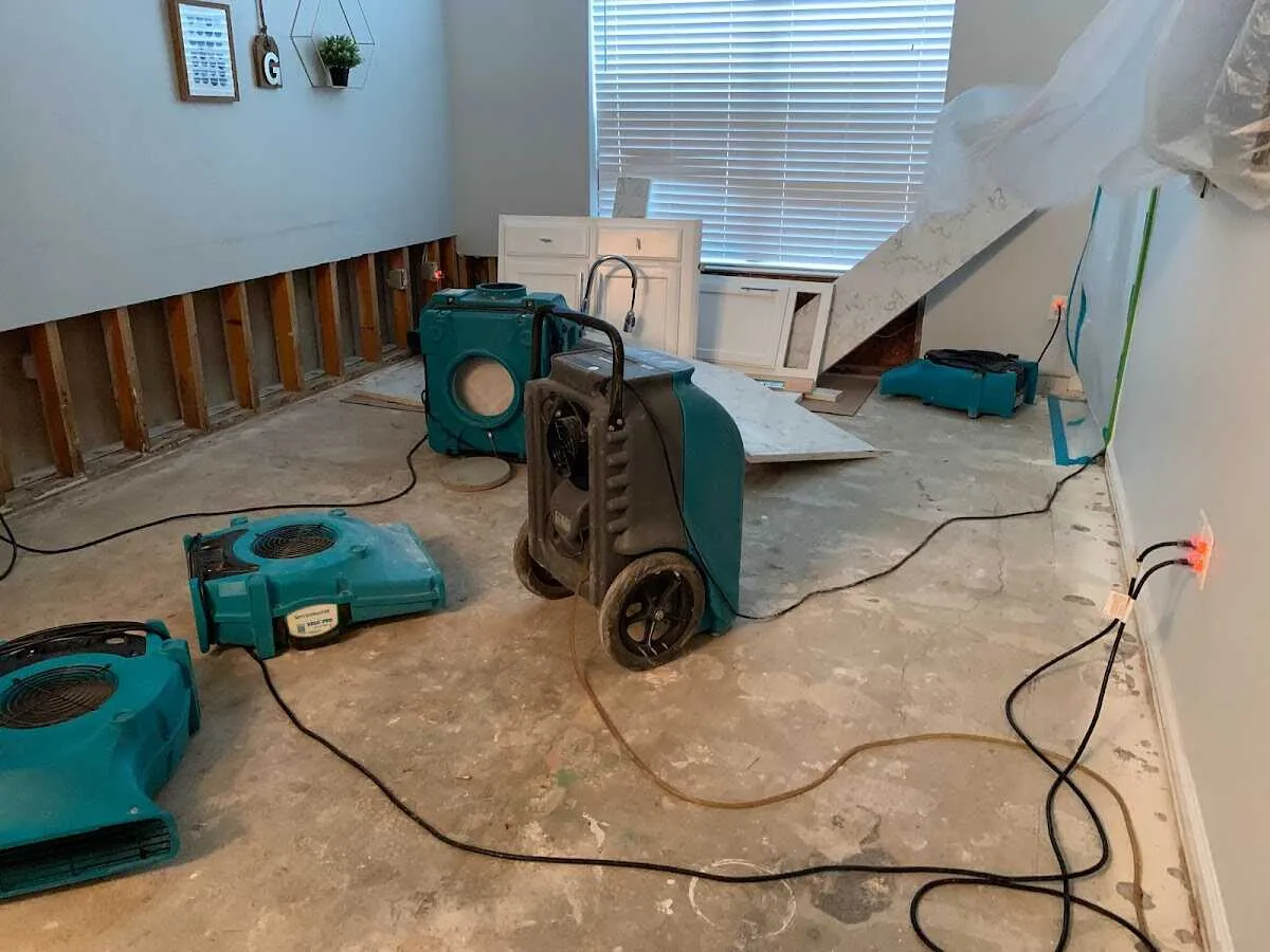 Dehumidifier in flood-cut room for Water Damage Restoration in Boxford